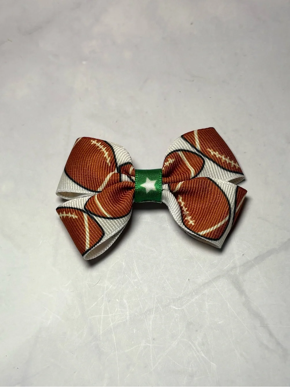 🏈 Football Print Hair Bow with Green Star/Football Center
